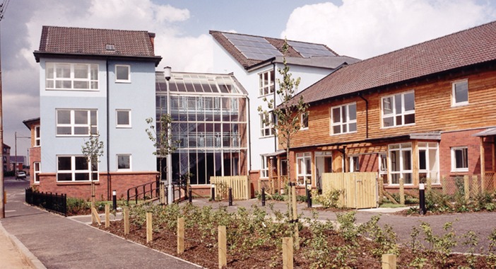 View of a housing development, showing atrium space and terraced housing.