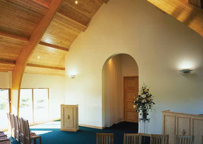 A service room with white walls and pale colour wood ceilings.