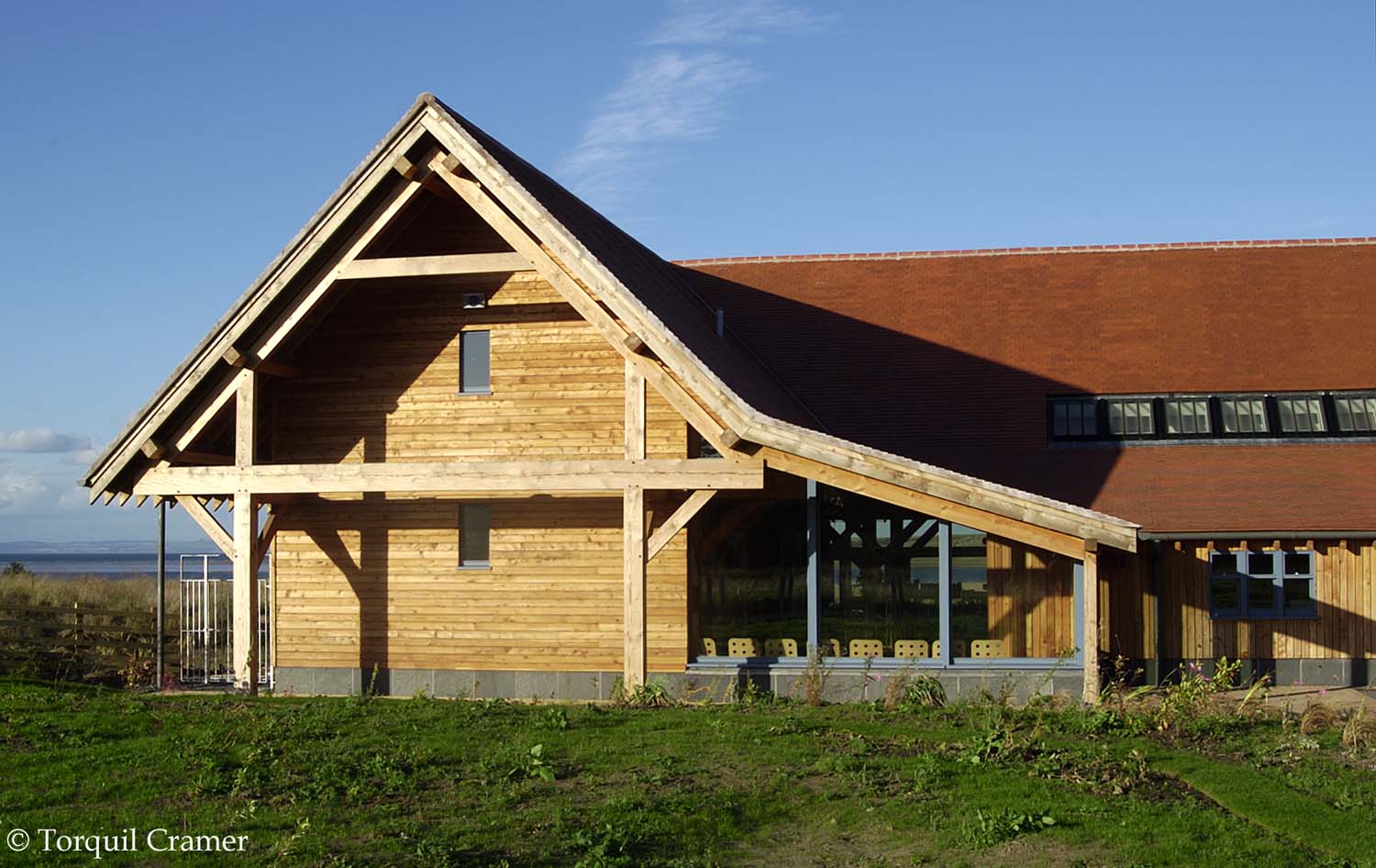 A closer look at the horizontal wood cladding that covers the exterior wall of the entrance side of Waterston house. 