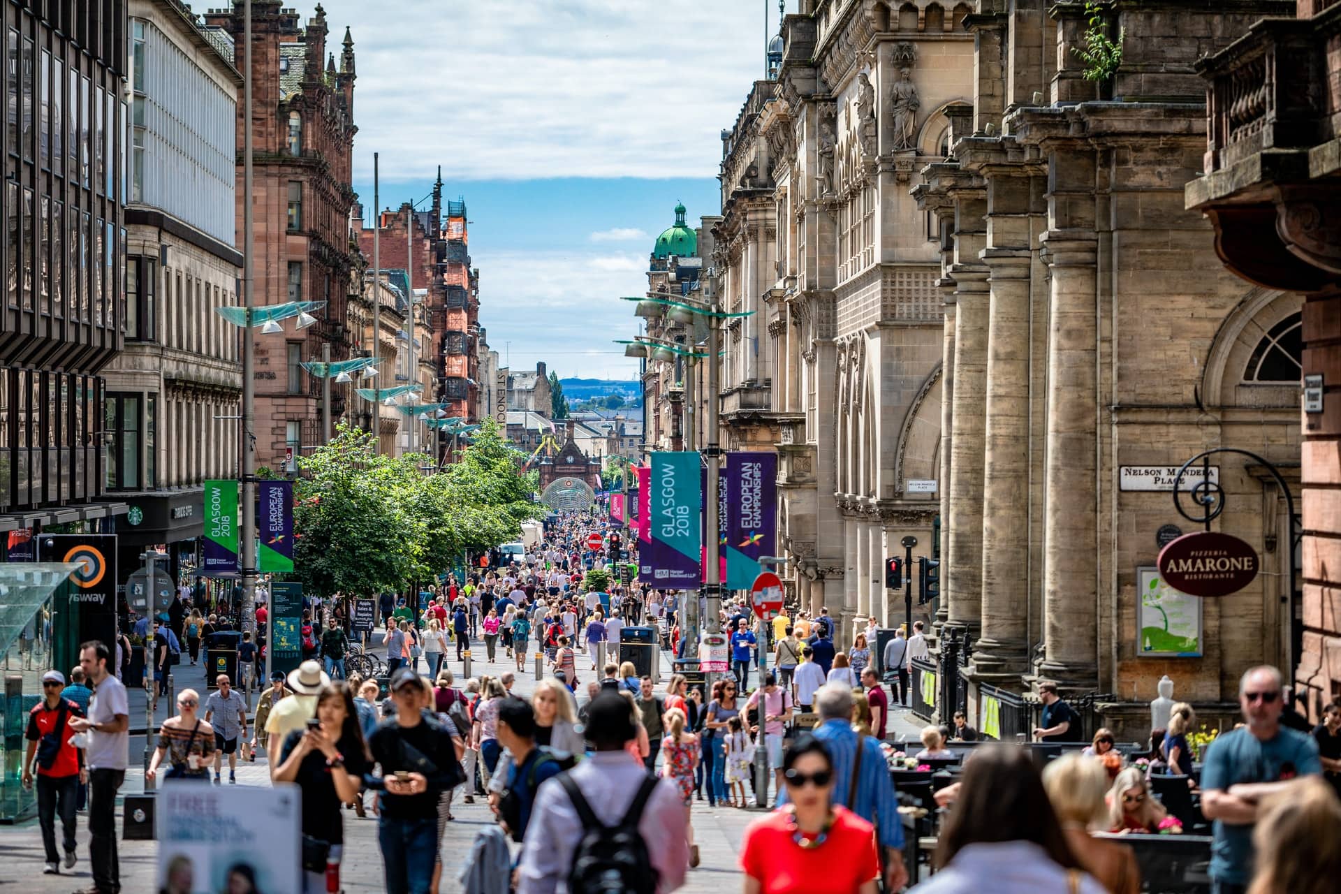 People walking through Glasgow high street. 