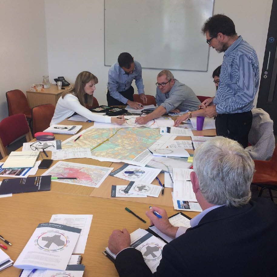 Clackmannanshire Council member's using the Place Standard tool in a workshop by mapping it out on an A3 piece of paper.