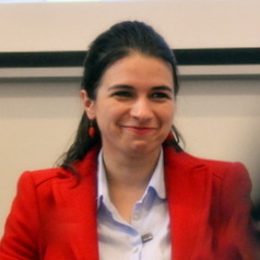 Board member of A&DS Dr. Georgiana Varna smiles at the camera.