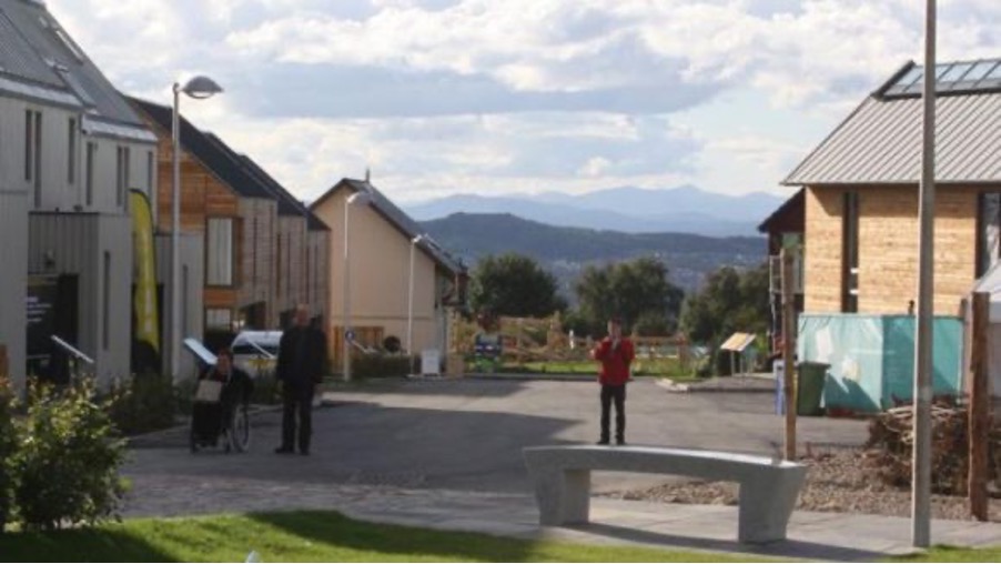 A photograph of the Main Street of the housing expo in Inverness