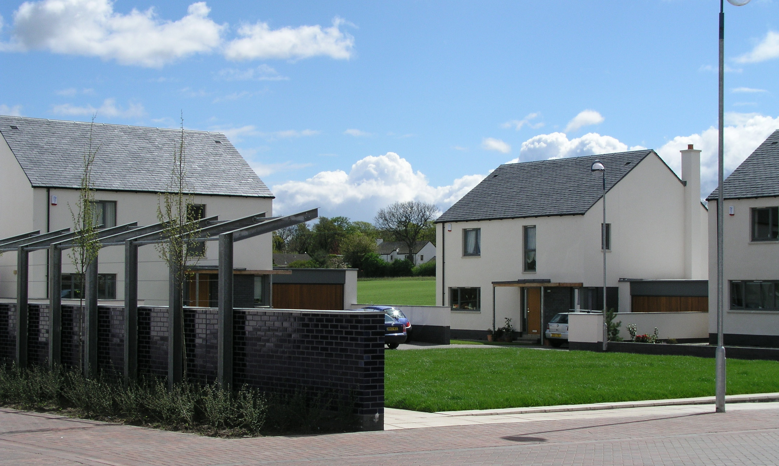 A shared communal garden area at Maryfield Housing on a sunny day. 