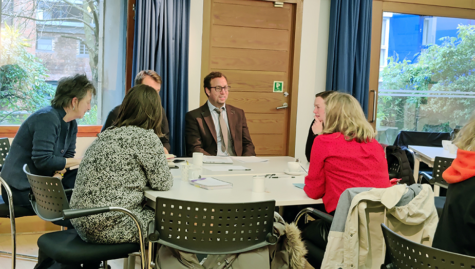 Attendees at the LAUDF16 event sitting around the table during the networking session.