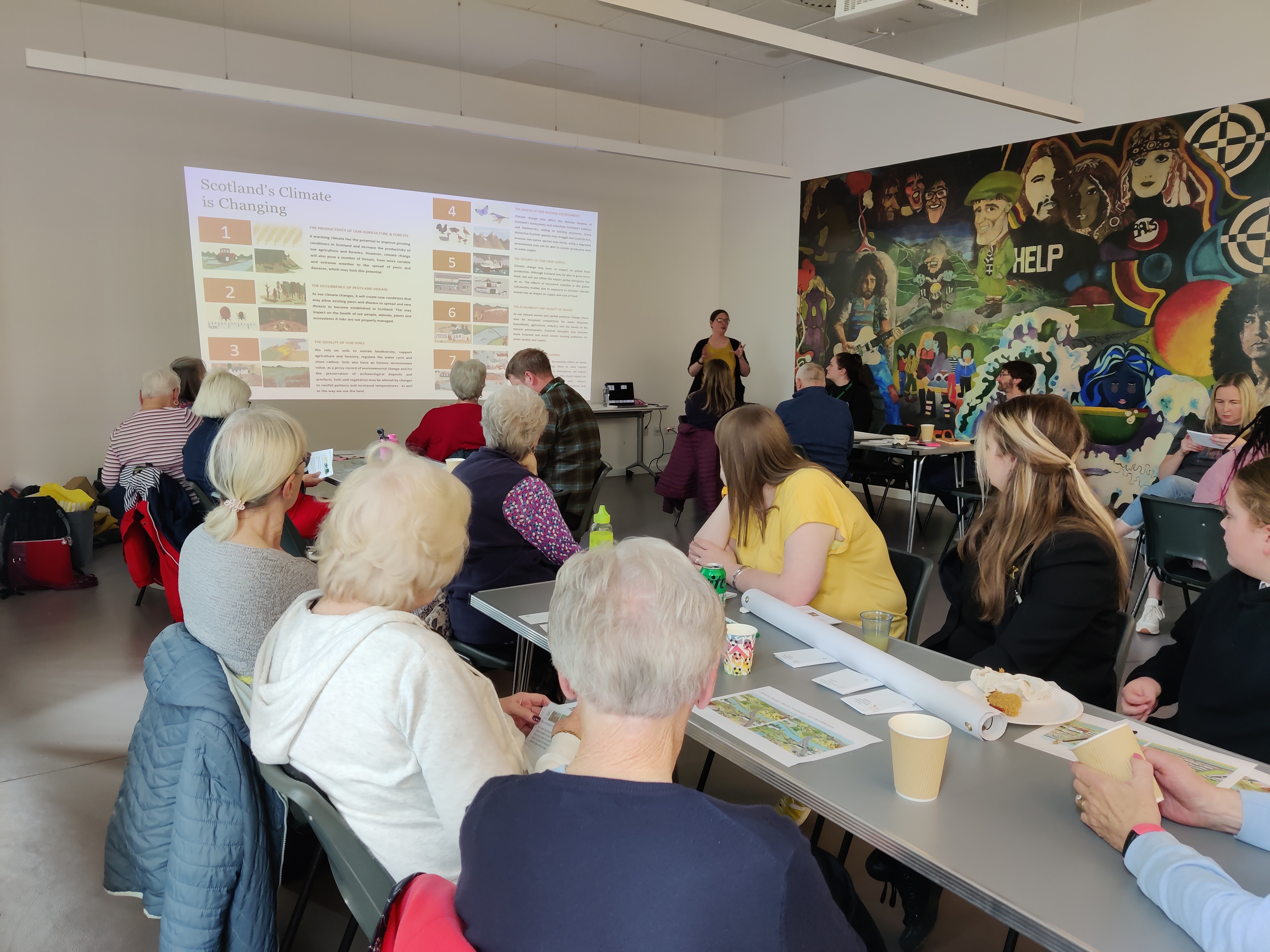 People sitting at a Climate Action Town workshop in Blackburn