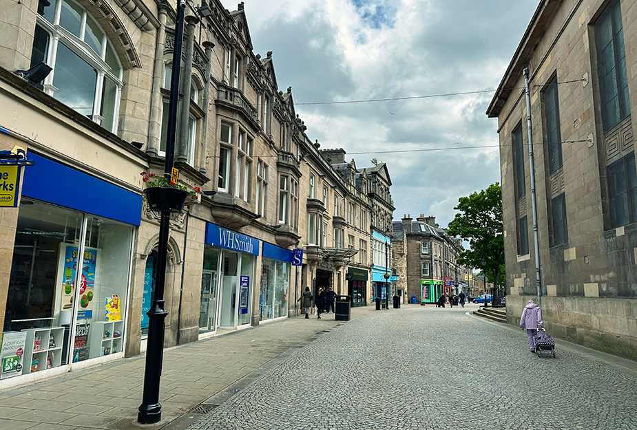 A high street in Elgin during a quiet time in the day.