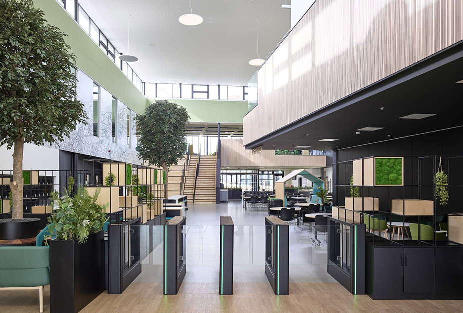 Access barriers leading to the central atrium at  Wallyford Learning Campus.