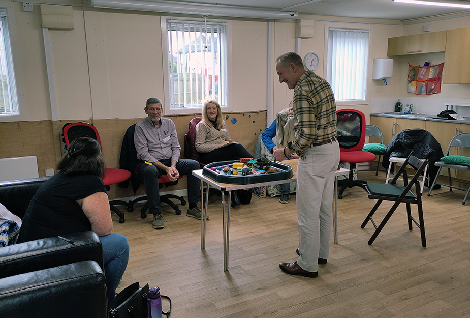 People gathered around a game at the Place Standard Armadale event.