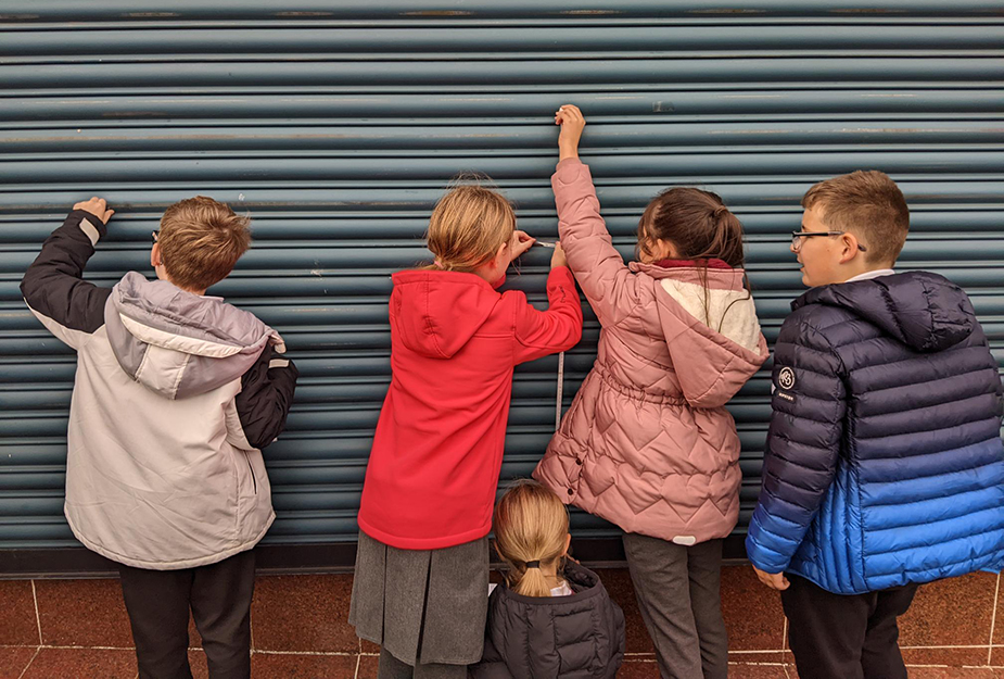 Pupils measuring air quality during Armadale Environmental Action Day.